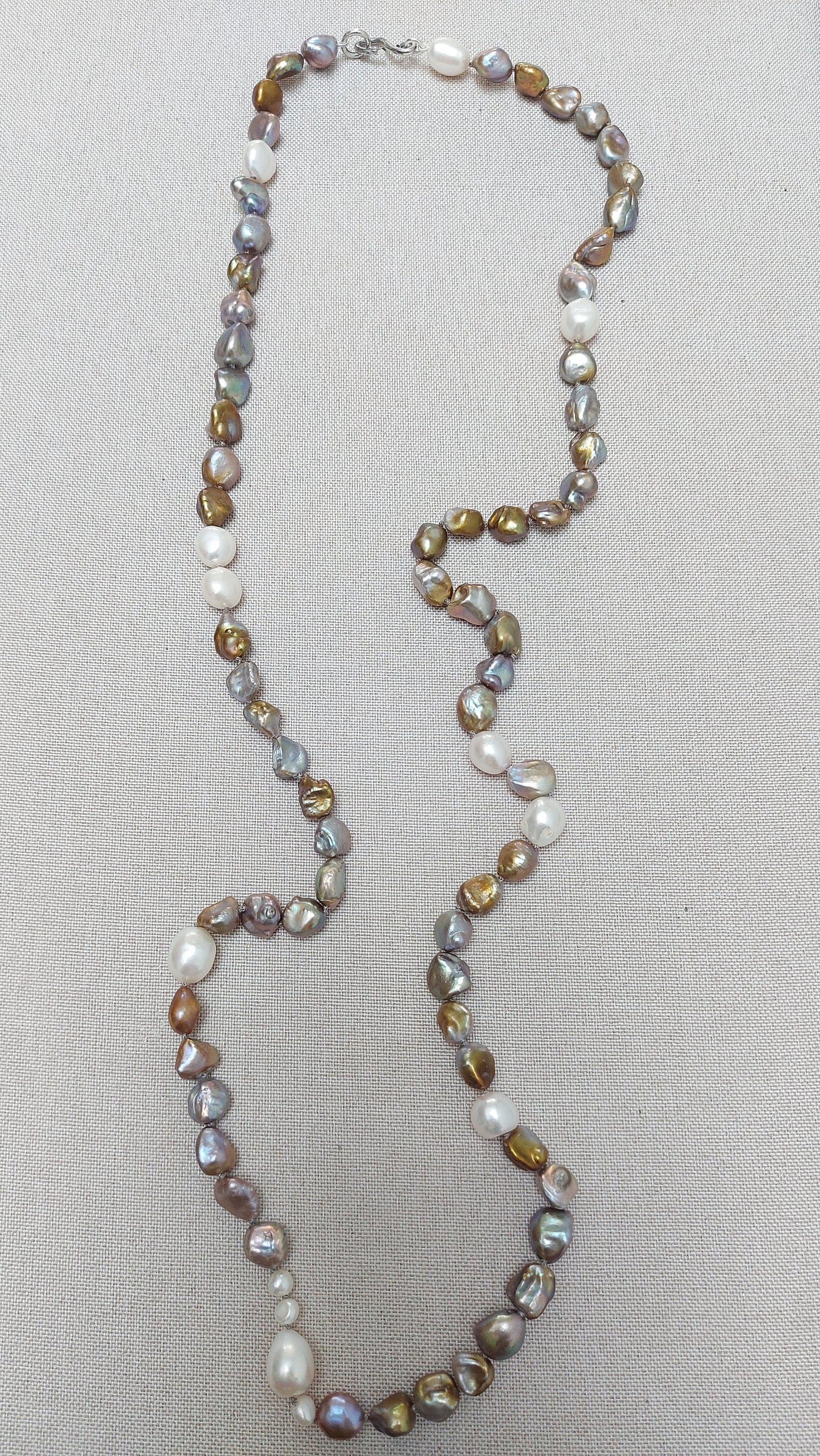 Long hand-knotted bronze baroque pearl necklace studded with white pearls silver hook clasp